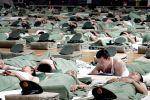 12-07-2008 ALGEMEEN:OLYMPISCHE SPELEN:BEIJING (NETHERLANDS ONLY)
Qinhuangdao, China, Policemen who will work for the security of Qinhuangdao Olympic Sports Center Stadium sleep in a basketball stadium.

Foto: CSPA.